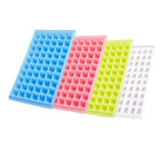 Overhead view of the 60-Cavity Ice Tray with water in each compartment, ready for the freezer.