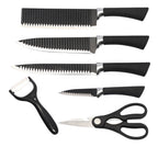 Elegant presentation of the stainless steel knife set with included peeler.