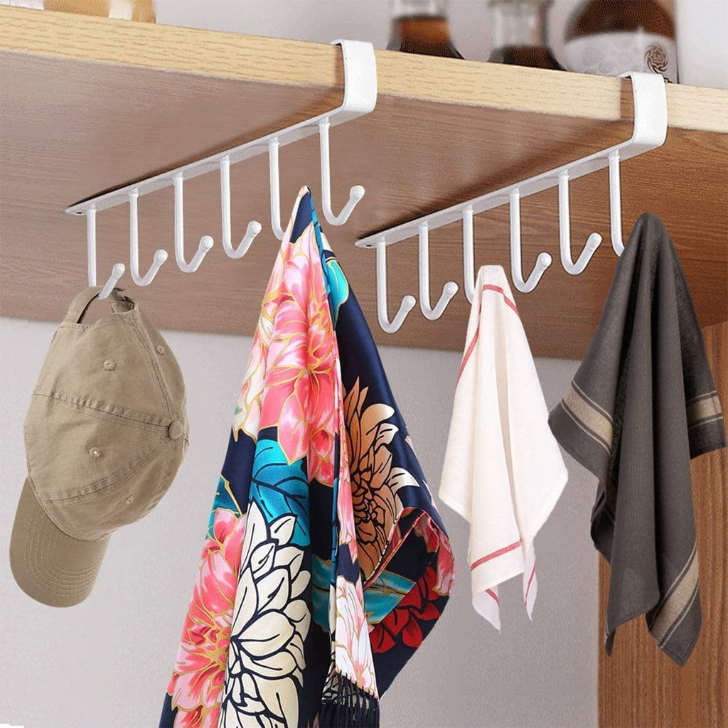 Under-shelf metal rack organizing kitchen utensils and tools
