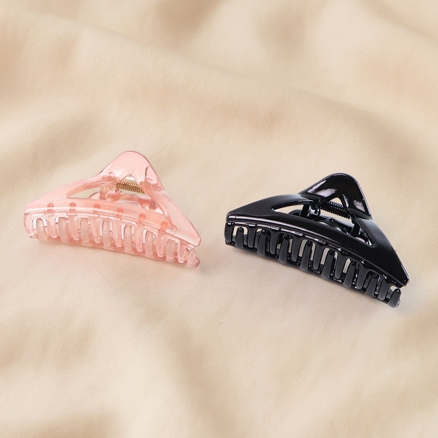 Hair claw clip showcasing sturdy spring-loaded plastic grip for secure hold