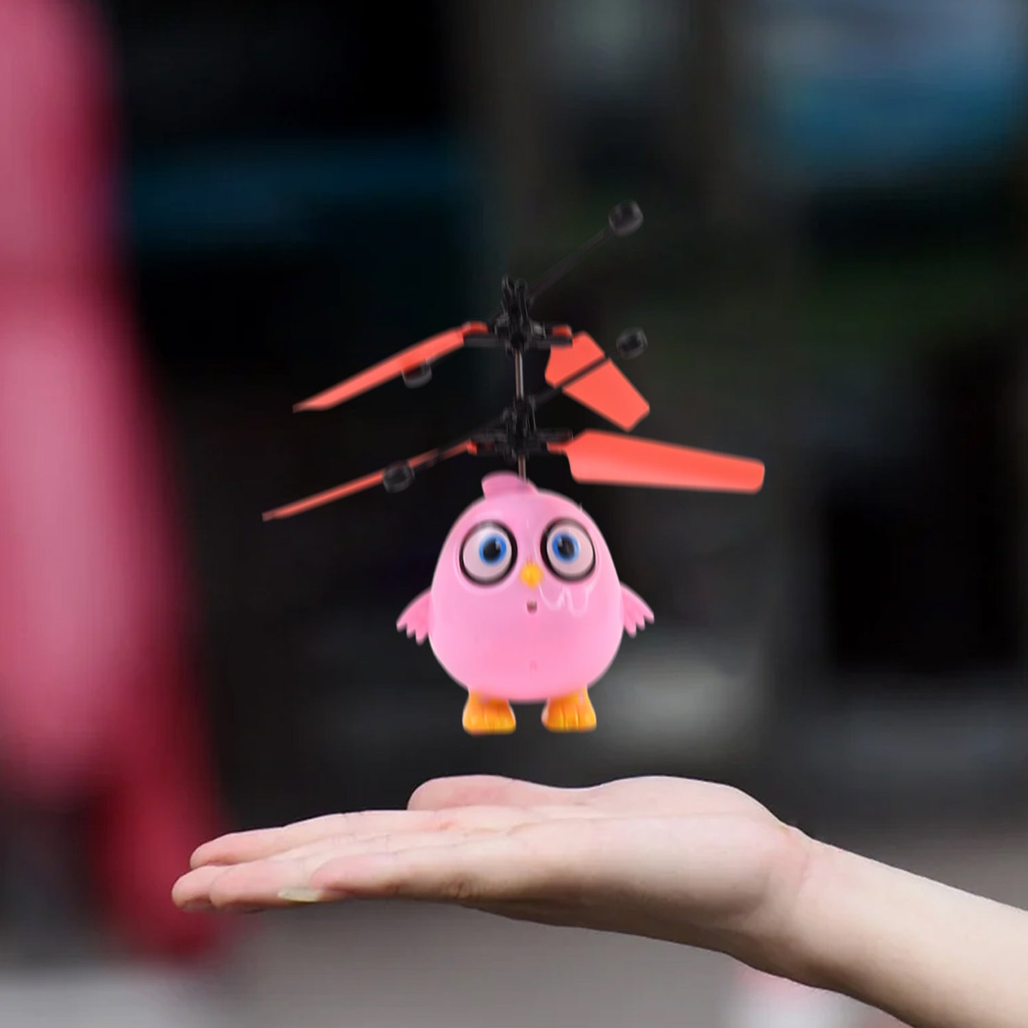 Close-up of the Neon Feather RC Flyer flying toy wings