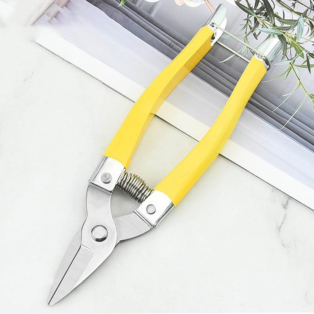 Compact pruning scissors ideal for precise garden trimming of small plants