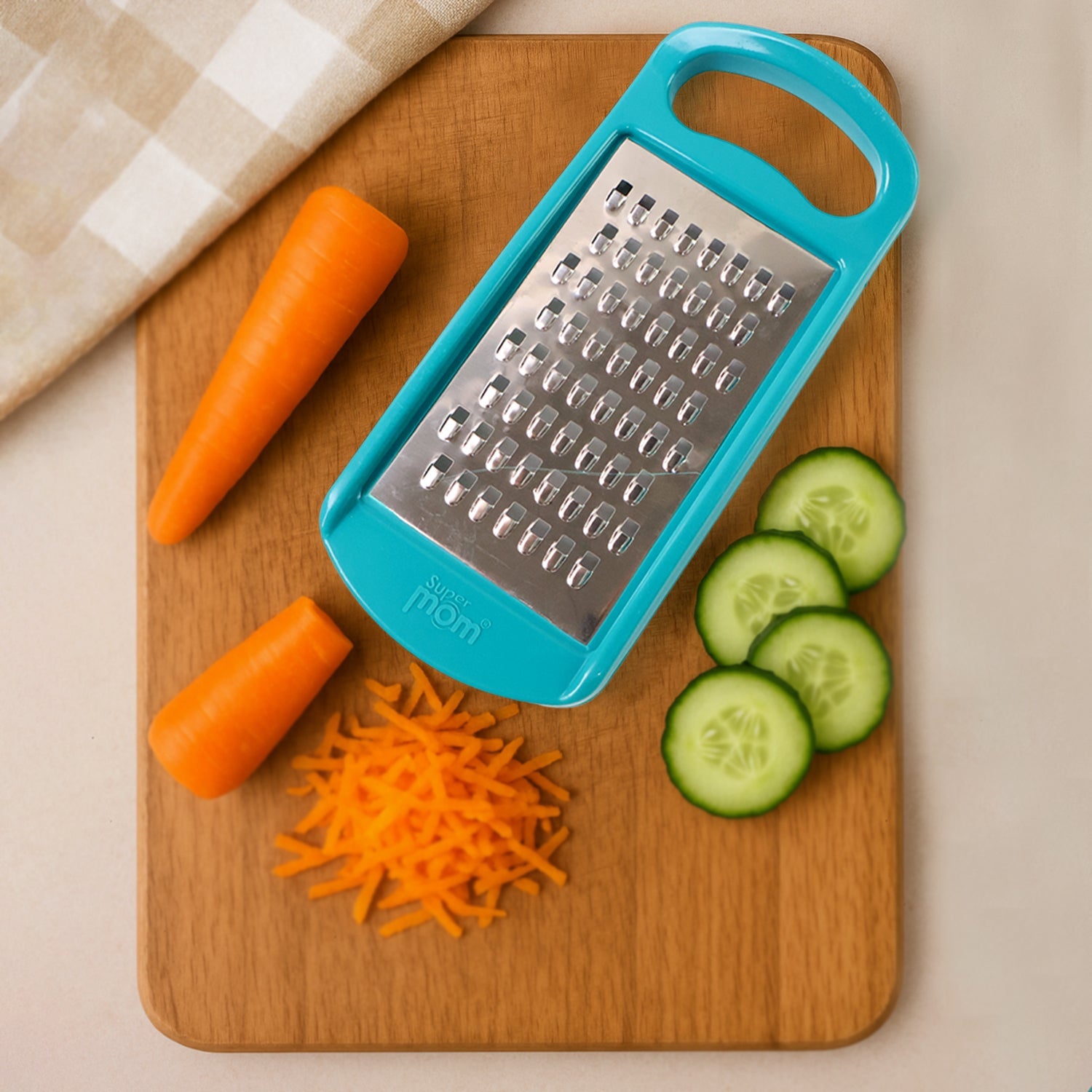 Top view of Supermom cheese grater blade and ergonomic handle