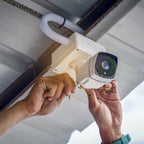 Protective camera box with secure lid, ideal for safeguarding surveillance cameras.