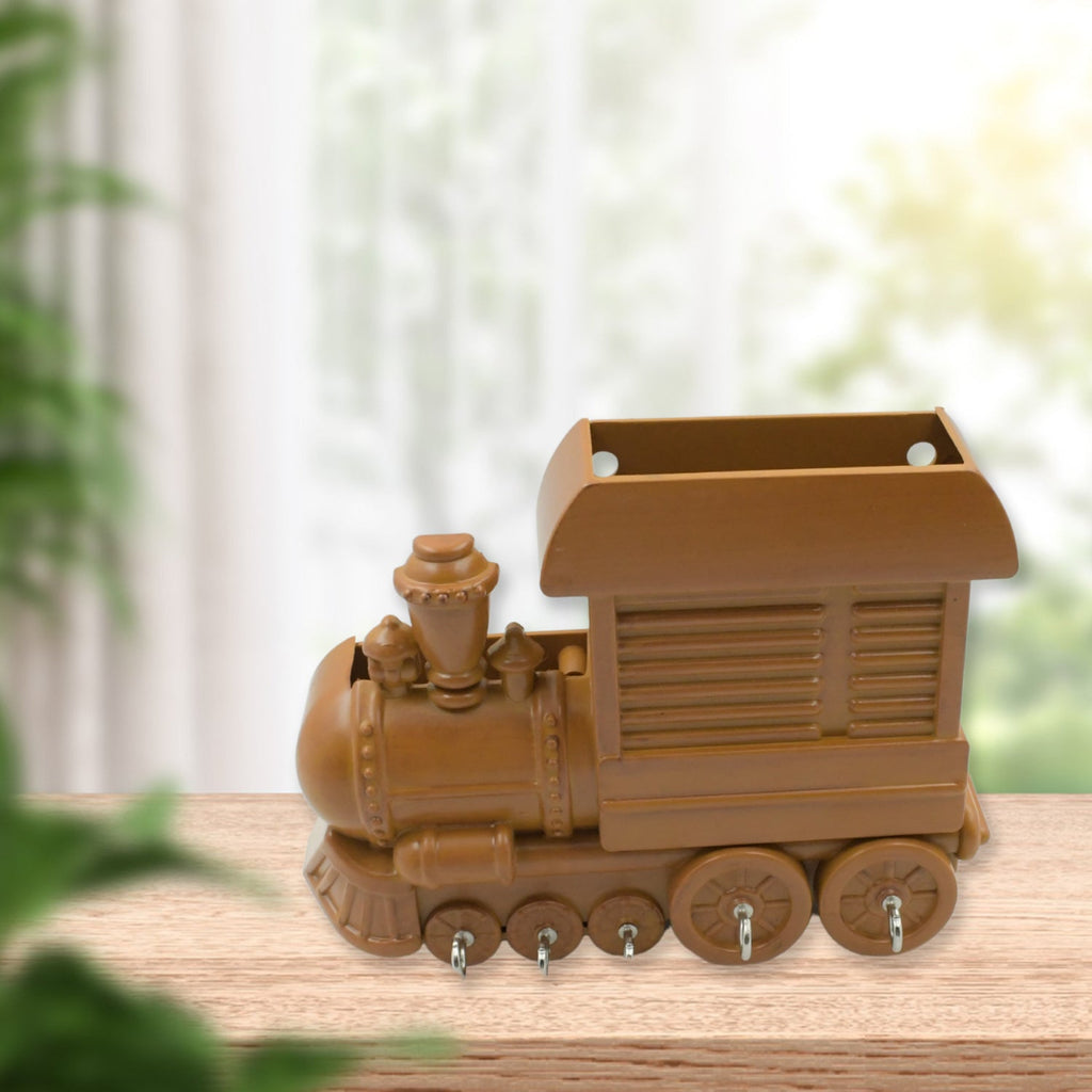 Side view of the train-shaped key holder, showcasing its design.
