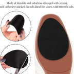 Hand demonstrating the easy application of anti-slip shoe stickers onto a high heel's sole.