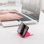 Side view of the Pyramid Mobile Stand holding a smartphone at an inclined angle.