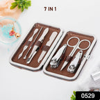 Compact 7-in-1 nail care tools kit in a stylish orange case