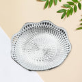 Traditional round mukhwas serving tray in durable plastic.
