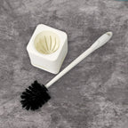 Complete toilet brush and holder unit, ready for immediate use.