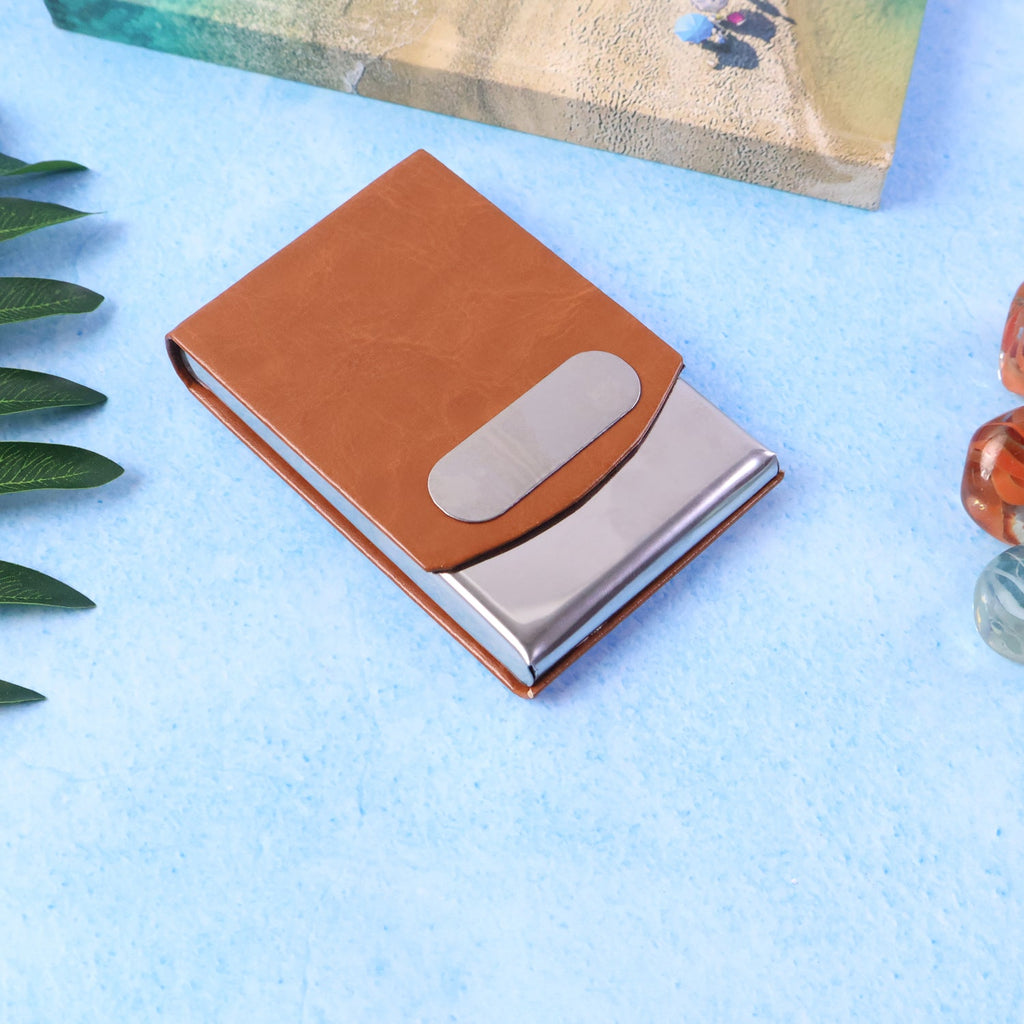 Business card holder with premium leather finish and stainless steel slide-out case