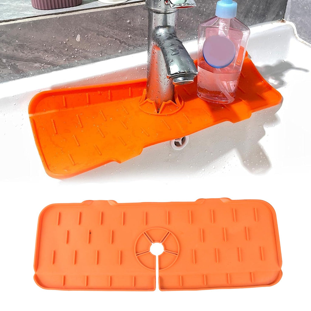 Flexible silicone sink mat positioned on a kitchen countertop to prevent water splashes.