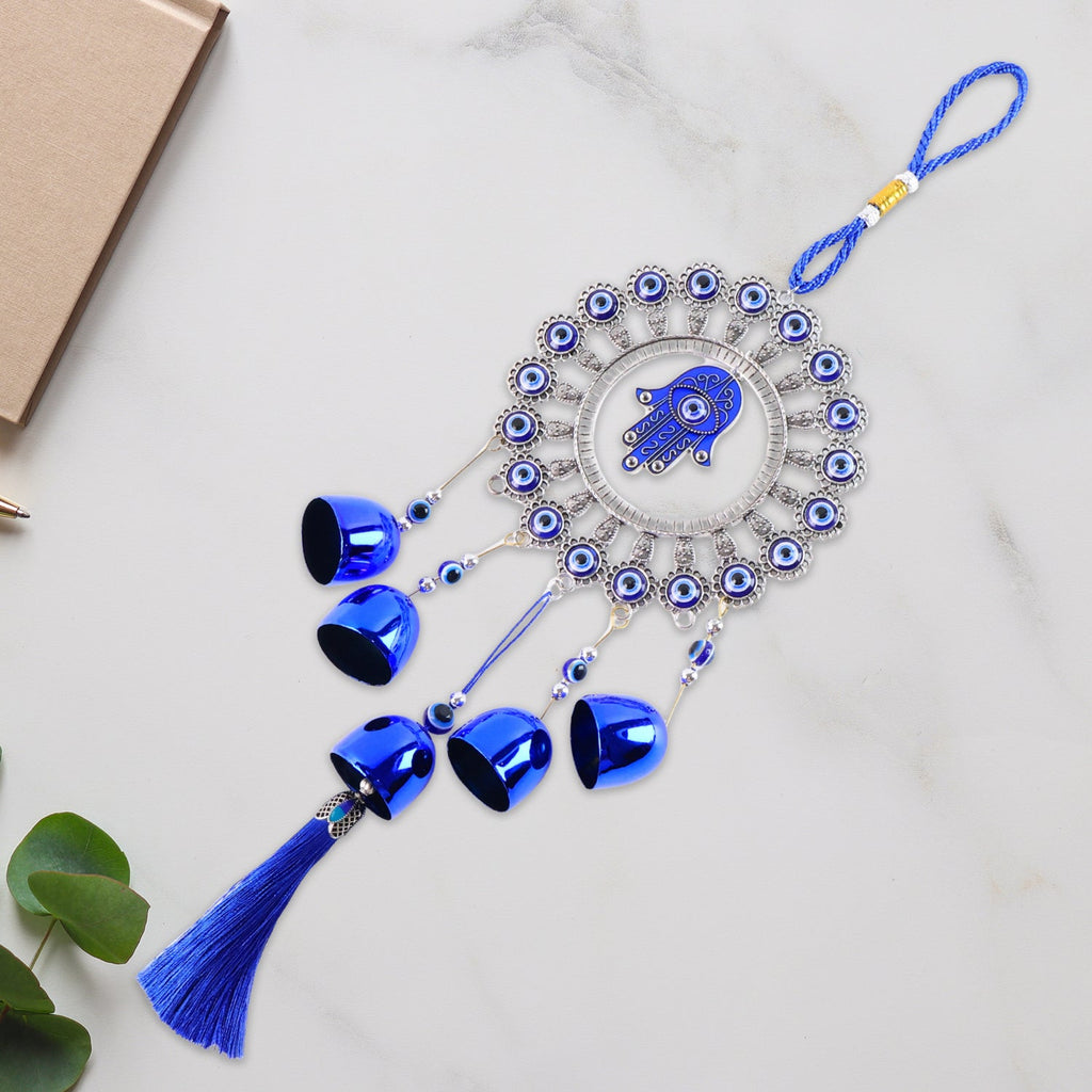 Decorative tassel on Om Evil Eye wind chime wall hanging