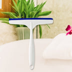 Ergonomic white kitchen wiper held by hand, ready for cleaning.
