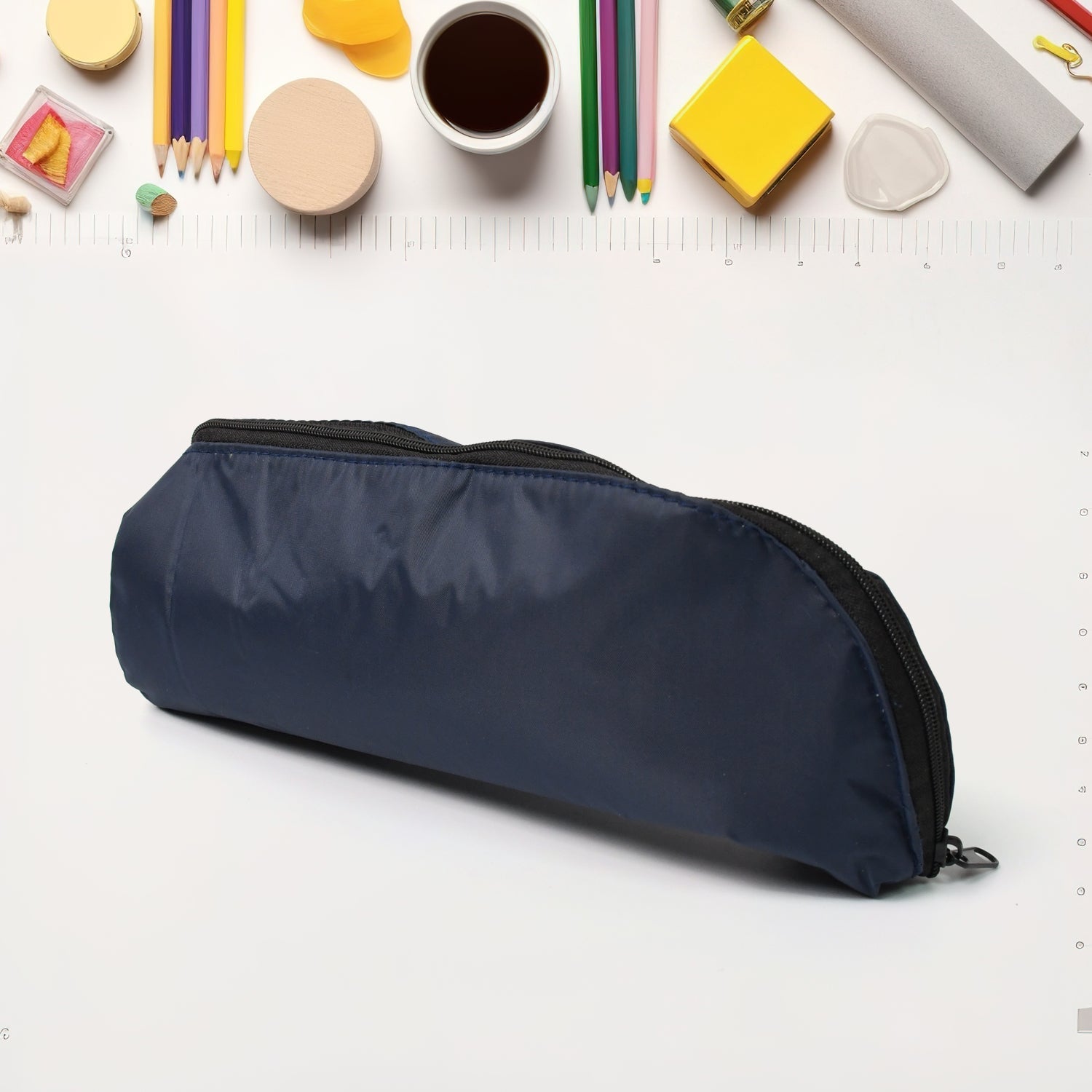 Side view of the versatile zip pouch, showing its slim profile.
