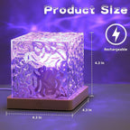 Close-up of the LED Crystal Lamp projecting colourful ocean waves on a surface.
