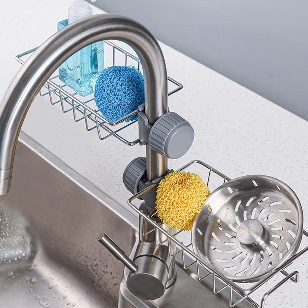 Stainless steel sink caddy organizer holding soap and sponge on kitchen sink