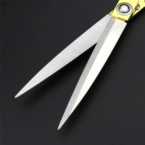 Side view of professional tailor scissors for dressmaking.