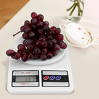 Precision digital kitchen scale featuring the tare function button.
