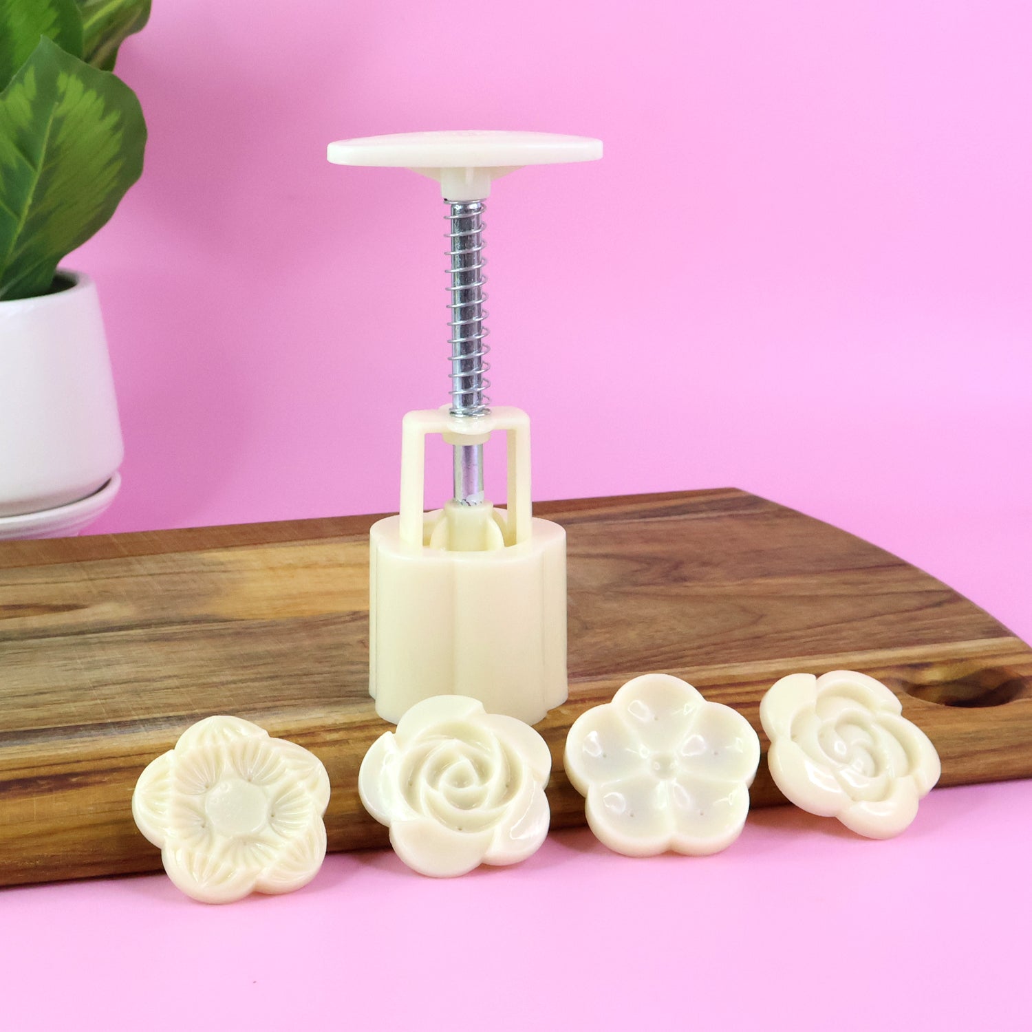 Delicious mooncakes and cookies decorated with floral press mold patterns