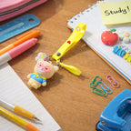 Cute cartoon teddy bear keychain with yellow I Love You strap attached to keys