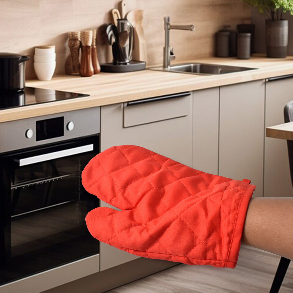 Person wearing a heat resistant oven mitt, safely handling a hot baking dish.