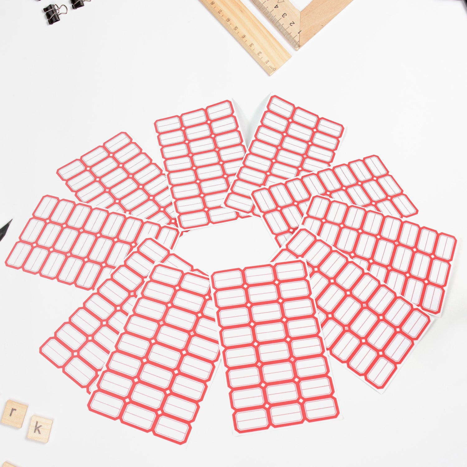 Multipurpose blank label sticker sheets featuring bold red borders for clear organization