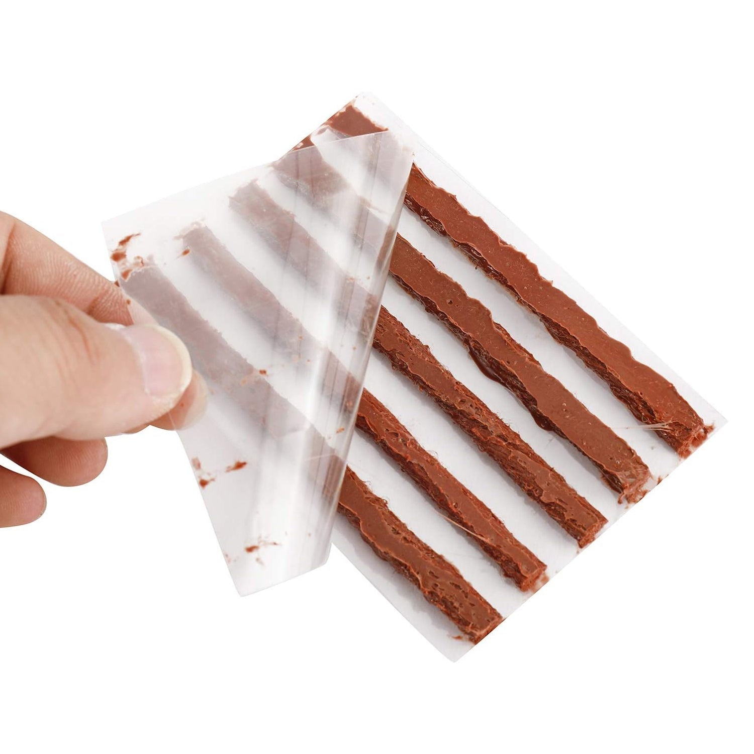Durable rubber tire repair strip for quick puncture patching