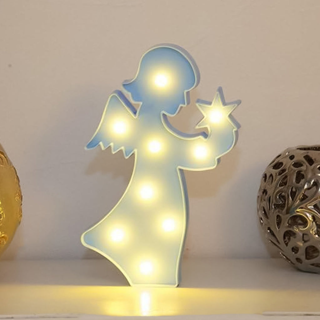 Rear view of the LED angel light, showing its battery compartment and sturdy base.
