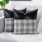 Close-up of a pair of Styleva Leather & Cotton Pillow Covers with elegant texture.