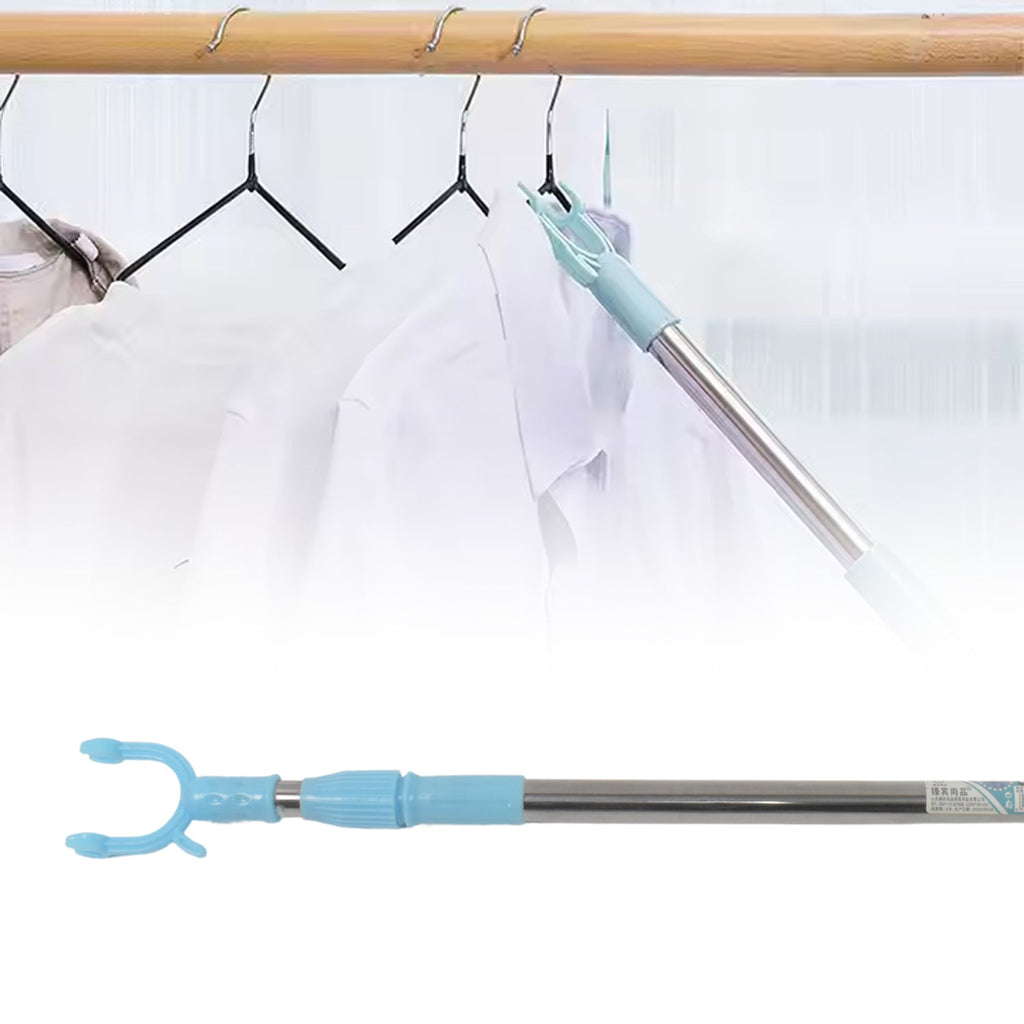 Person demonstrating use of the long closet pole to retrieve clothes.