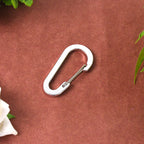 Small snap hook clasp with spring mechanism for easy use