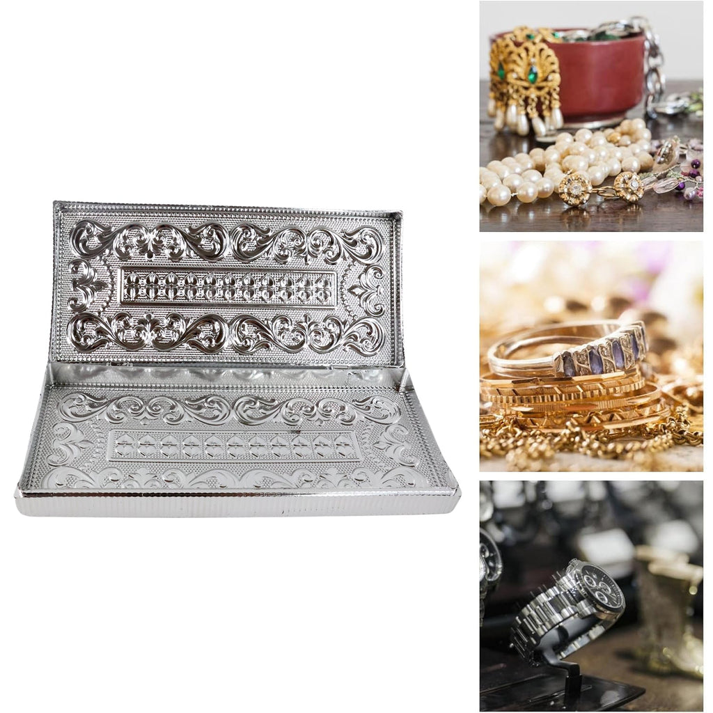 Close-up of silver embossed multipurpose cash box edges and ornamental details