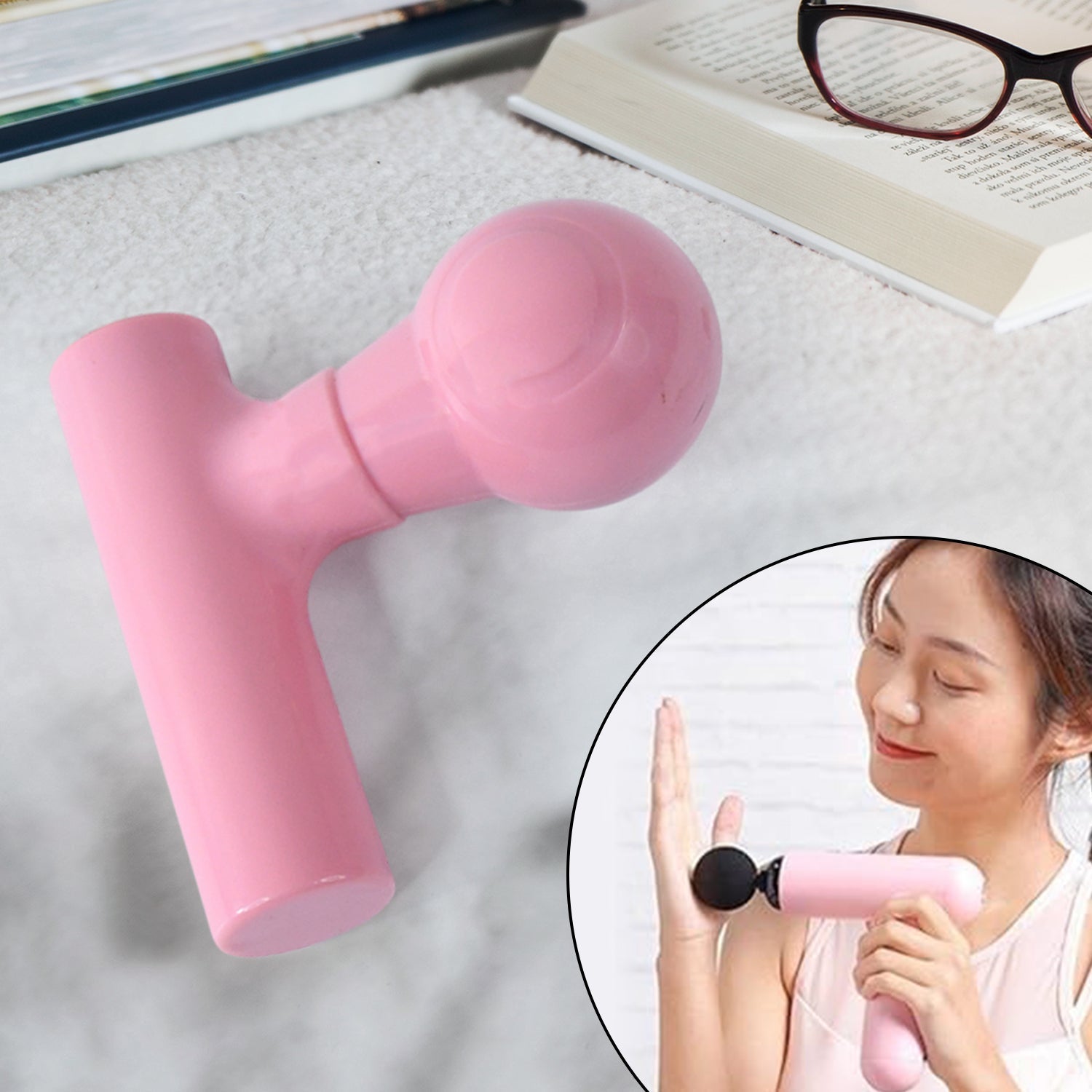 Angled side view of the black portable body massager.