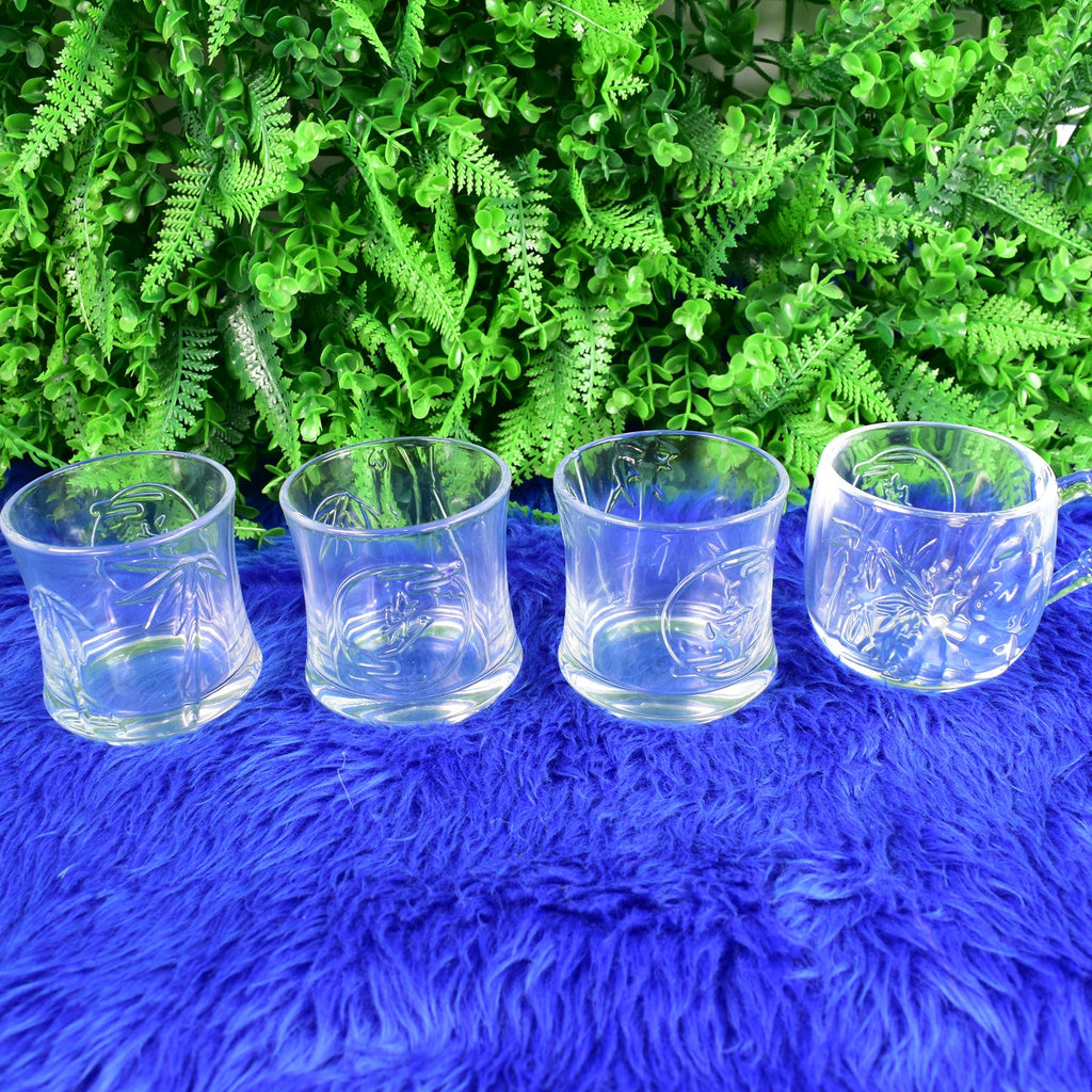 TableNest Glass Drinkware Set with textured mugs and tumblers on a light background.