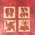 Set of wooden decorative cutouts featuring Shubh Labh and Swastik motifs