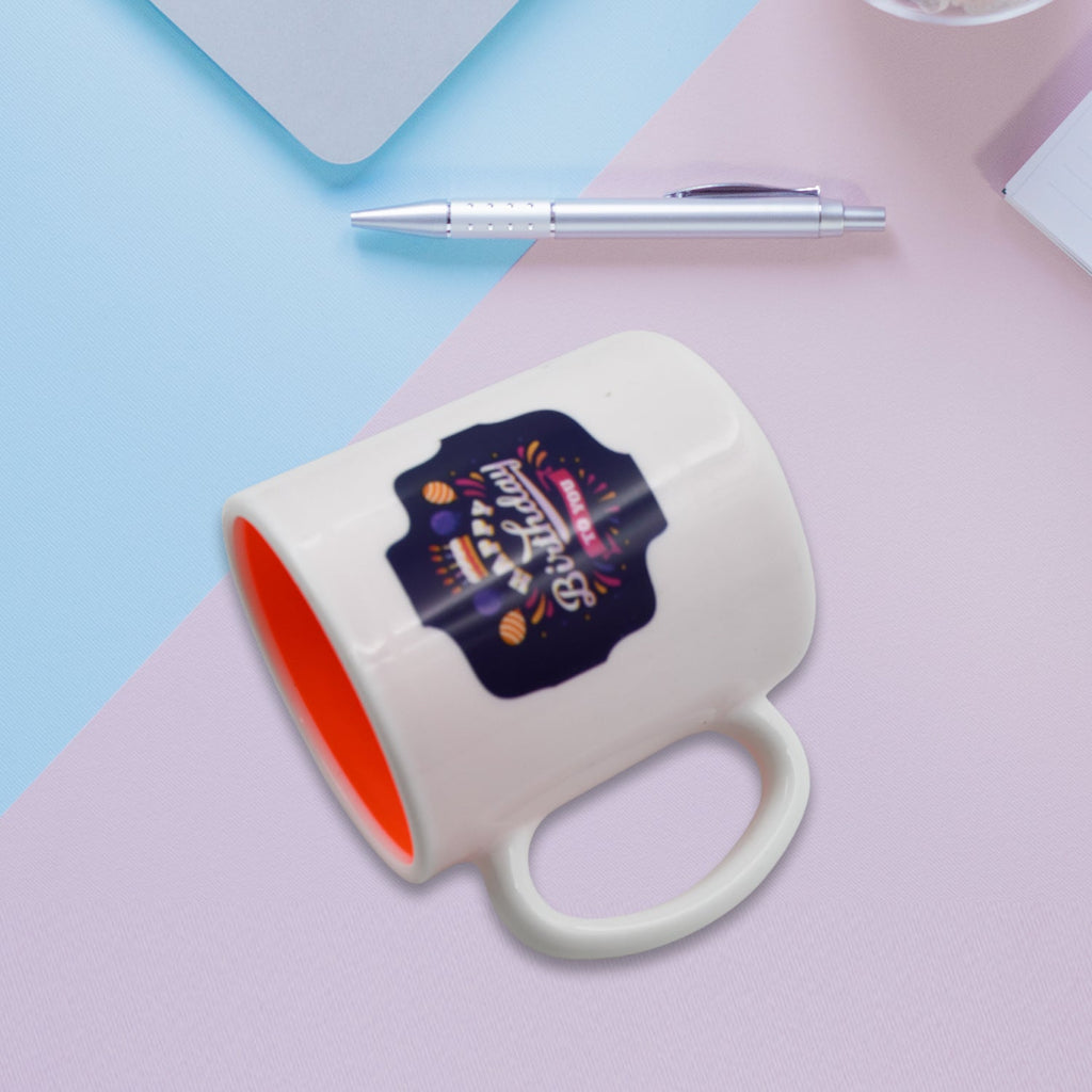 High-quality designer coffee mug with a spoon, highlighting its intricate pattern.
