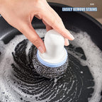 Pro Clean dish cleaning brush conveniently placed beside a modern kitchen sink.