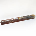 Close-up of a Styleva Agarbatti stick burning slowly, releasing aromatic smoke.