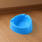 Plastic ashtray with wide bowl and cigarette rest slots in sky blue