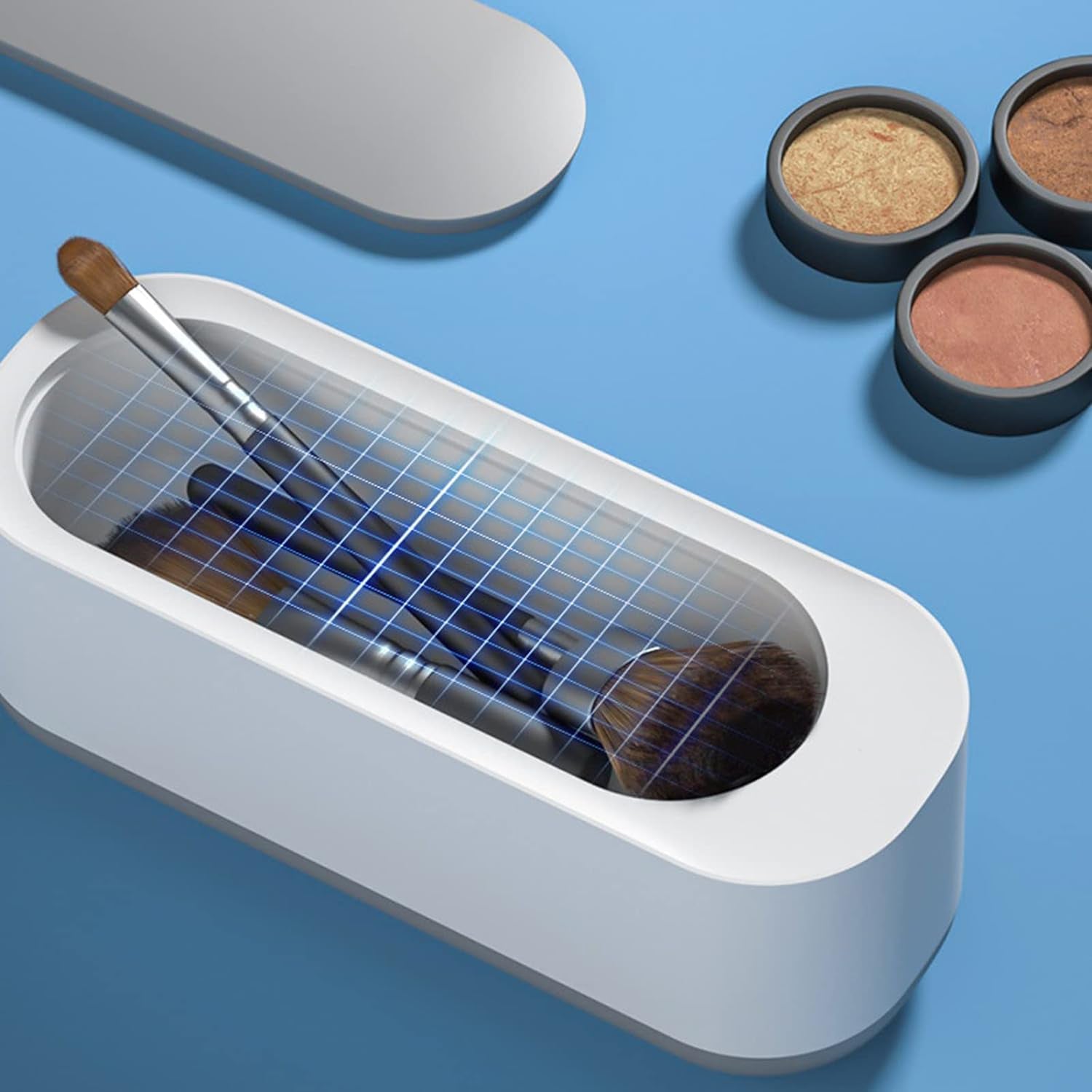 Velvet Wipe ultrasonic jewellery cleaner machine on a white surface.
