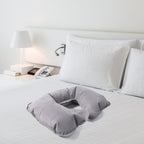 Lifestyle image using inflatable U-shape travel pillow