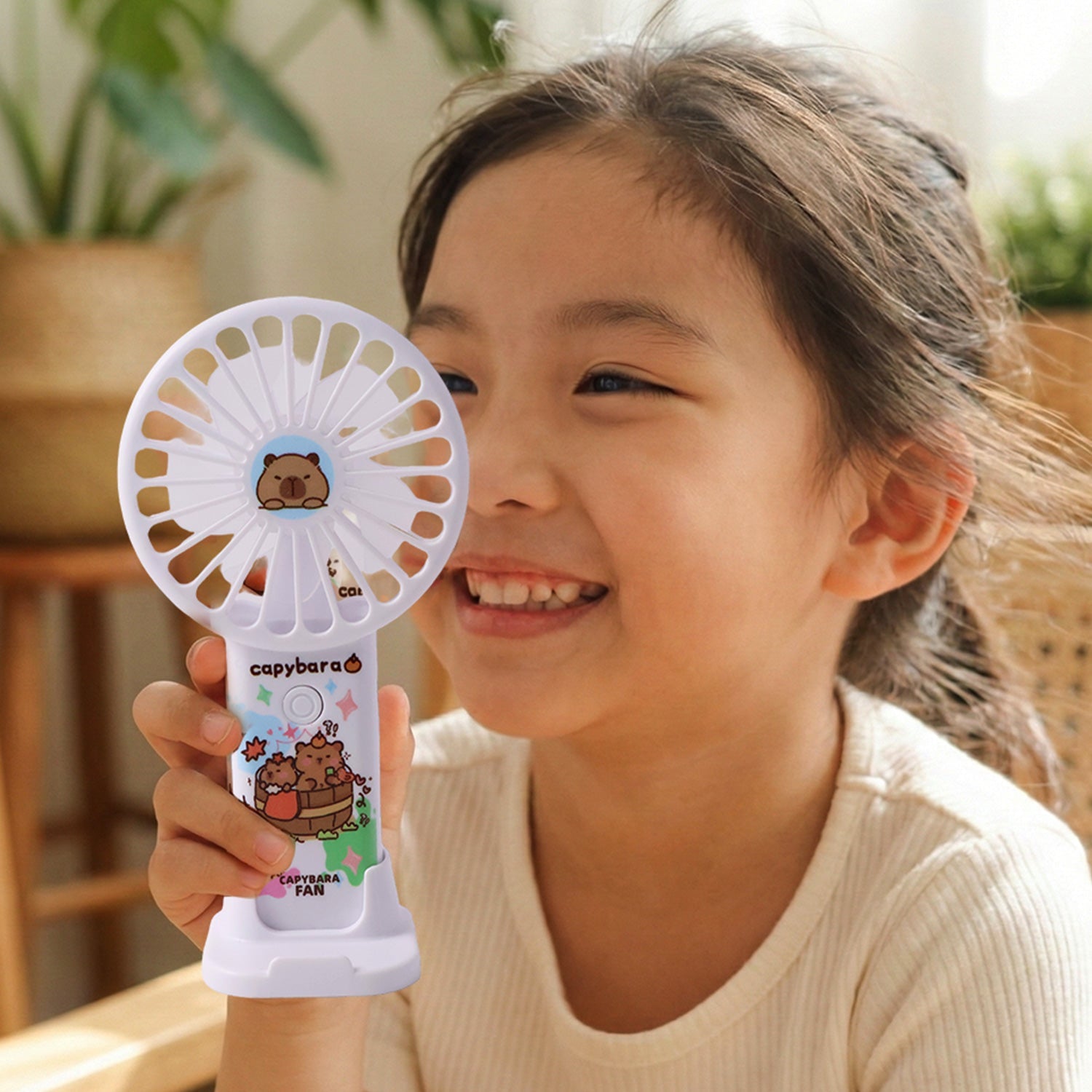 Compact cartoon capybara rechargeable mini fan with USB charging port