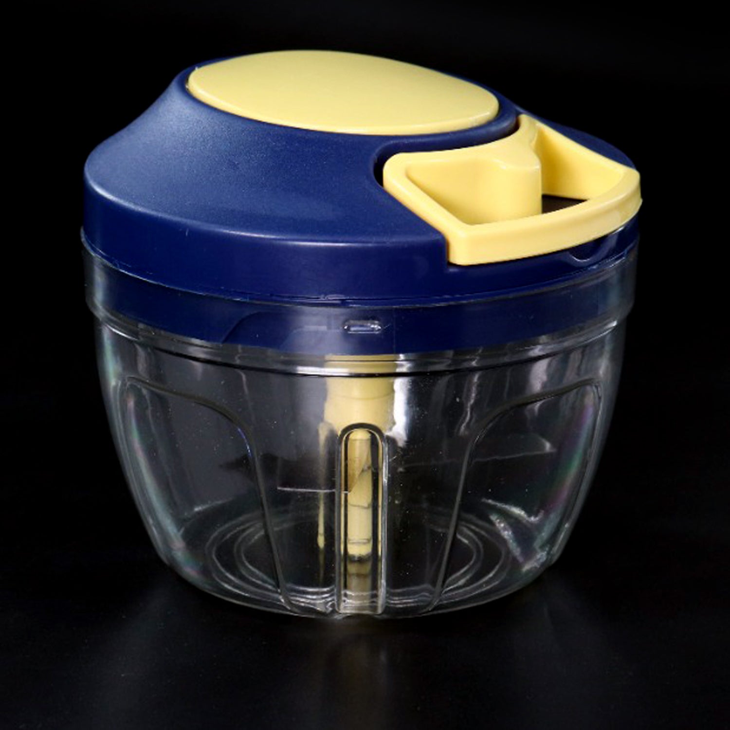 Chopper filled with various fruits, showcasing its versatile use.