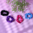 Close-up of a soft elastic hair scrunchie holding hair gently, highlighting its smooth texture and no-pull design.