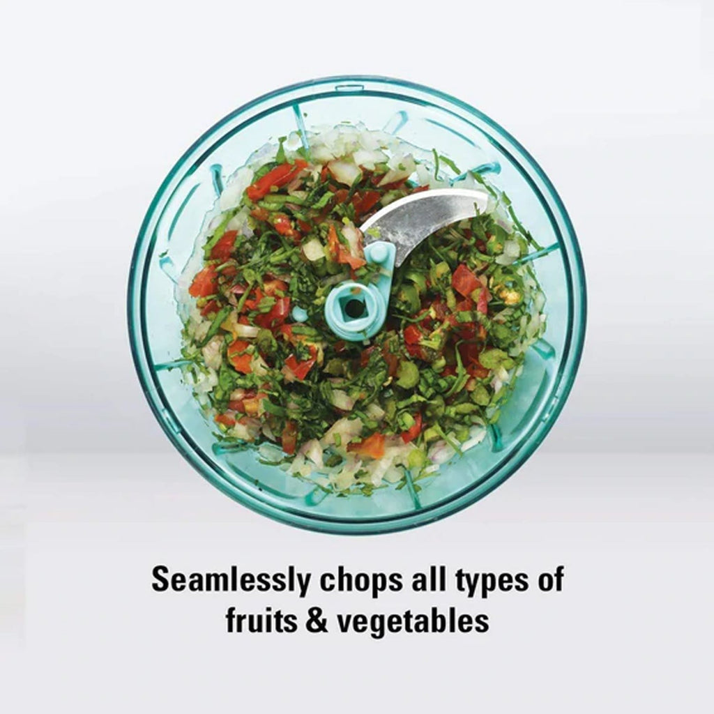Disassembled Mini Vegetable Chopper showing lid, blade assembly, and transparent bowl.