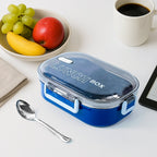 Open airtight steel lunch box with compartment separation and spoon