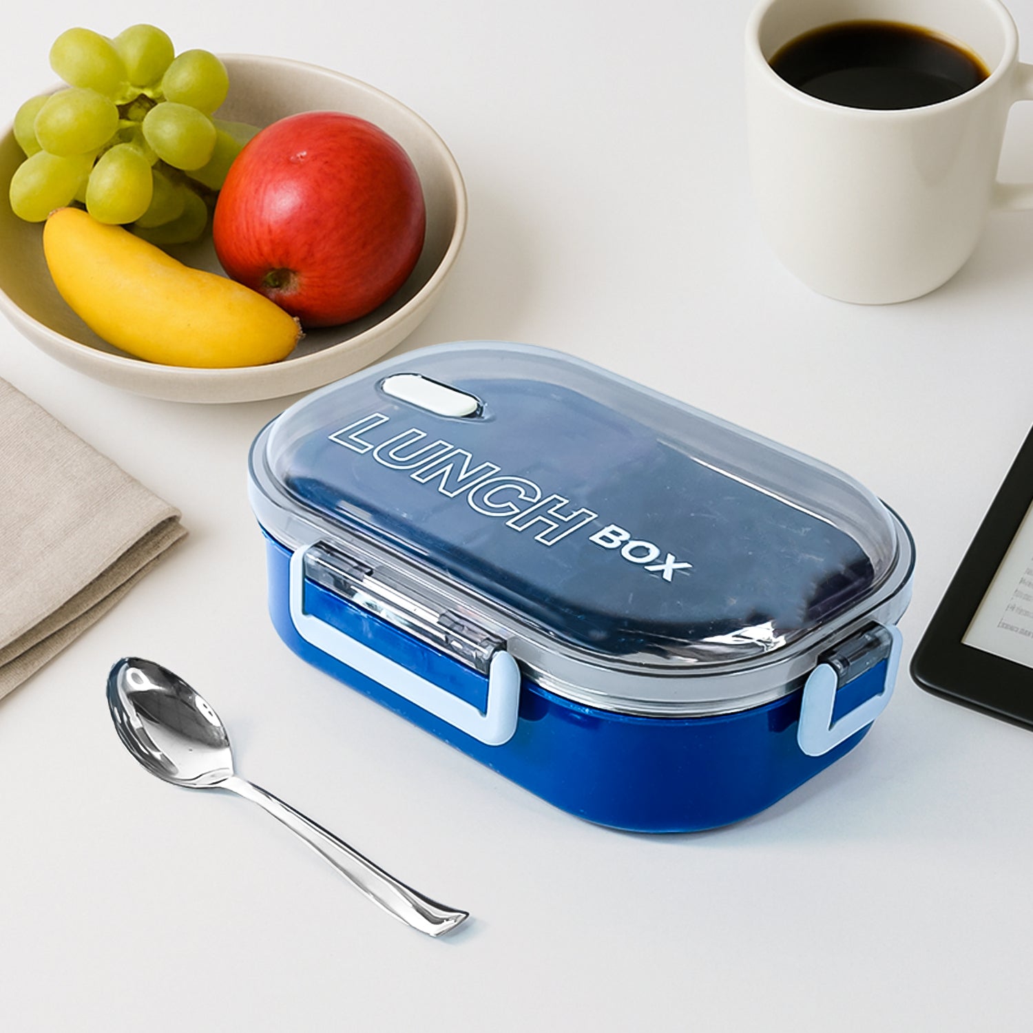 Open airtight steel lunch box with compartment separation and spoon