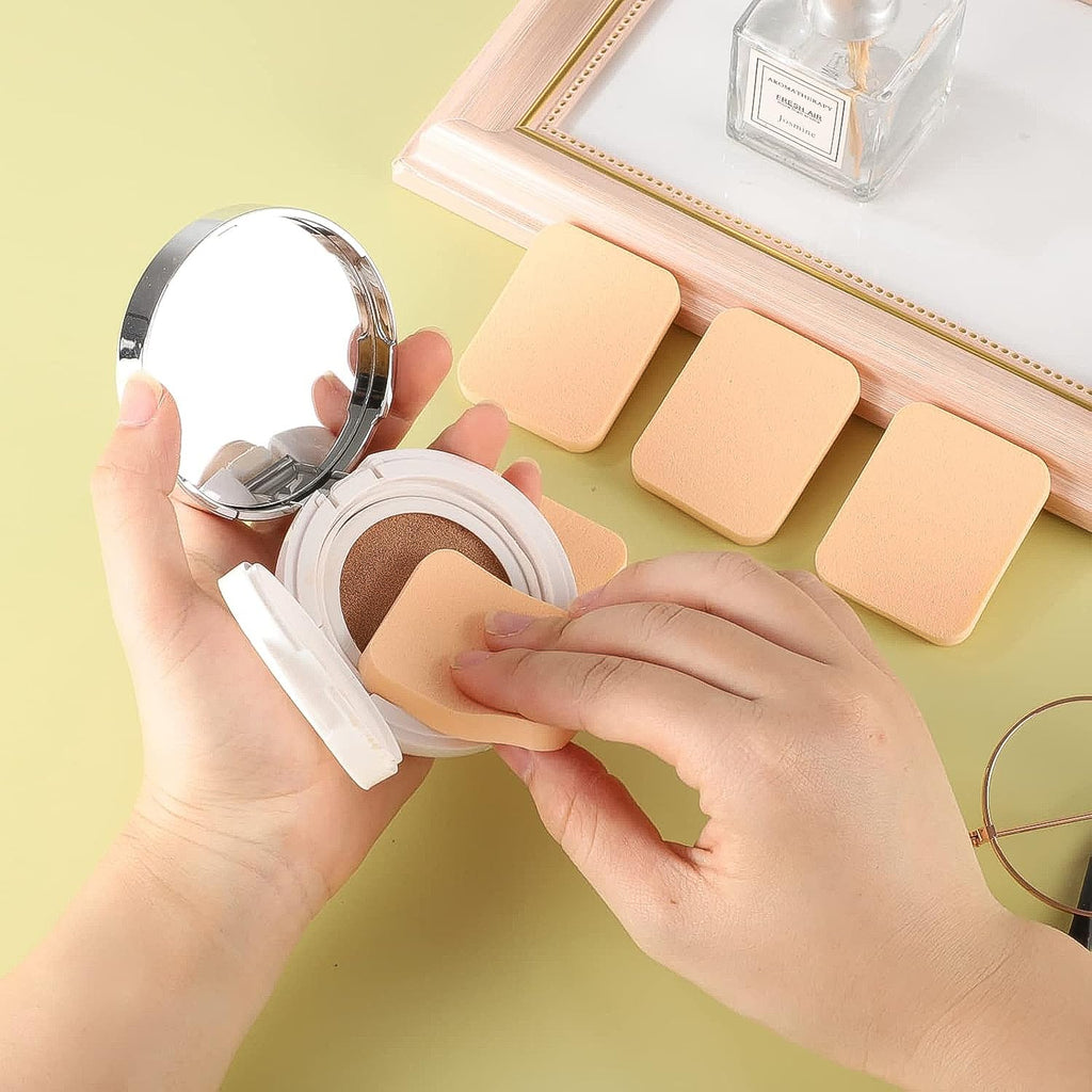 Ergonomically designed makeup sponges in different colors for blending and contouring.