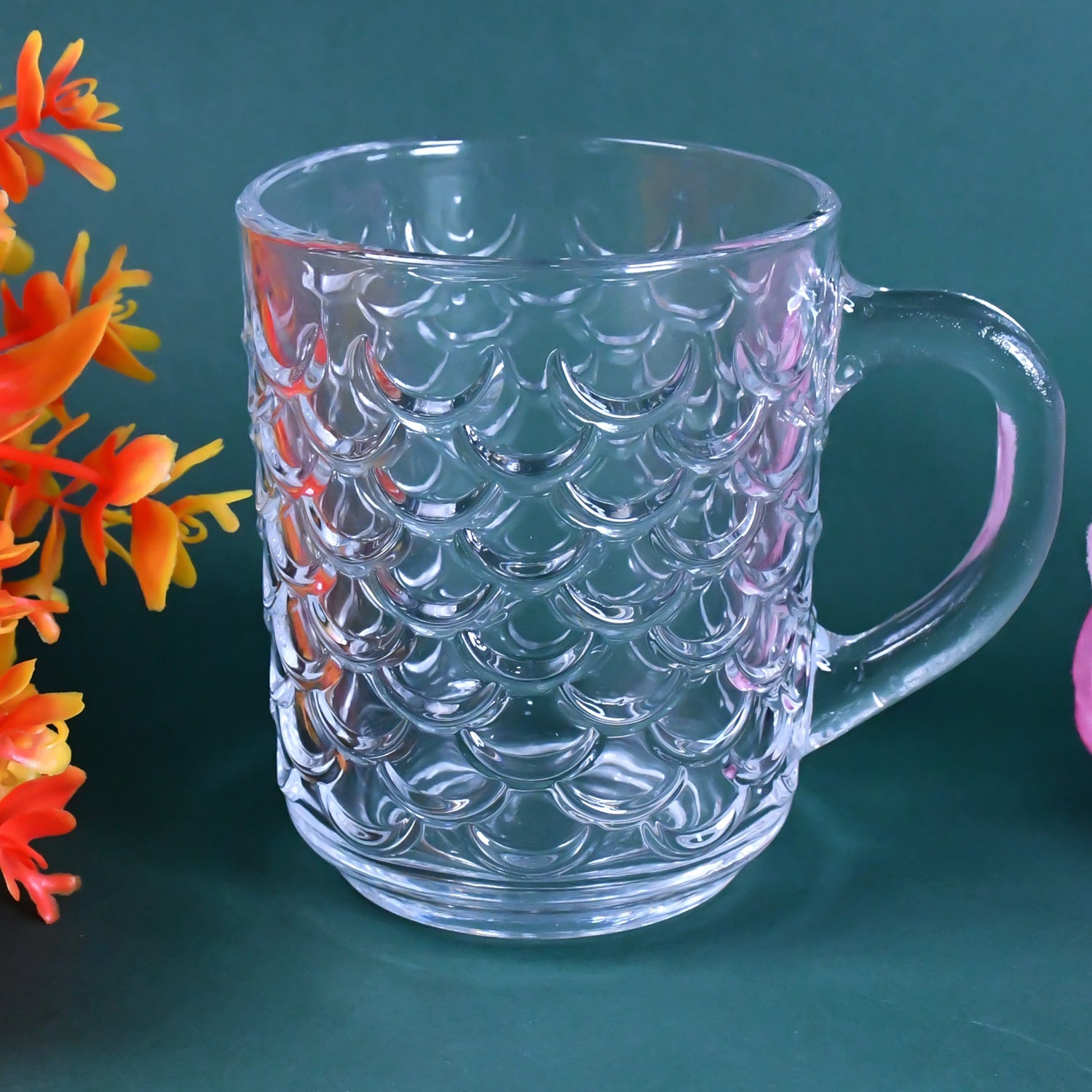 Stylish arrangement of heat-resistant clear glass cups, perfect for tea or coffee.